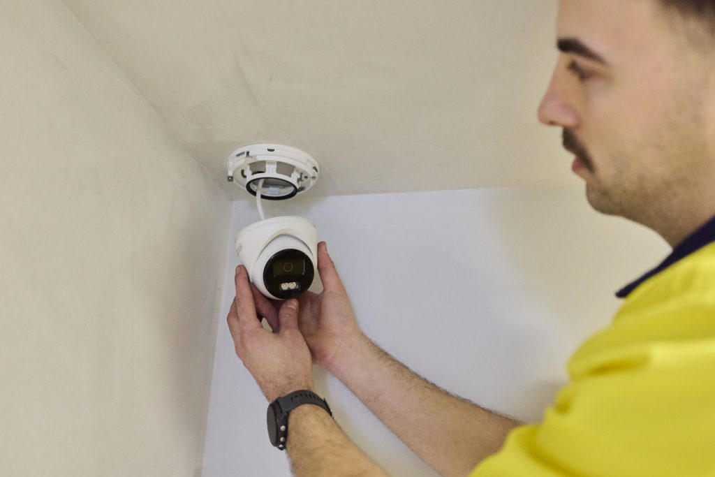 CED technician installing a CCTV camera at a Heidelberg office site